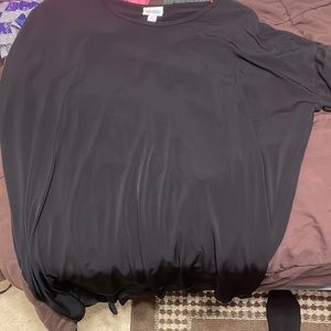 Half sleeve blouse. Very slinky material.